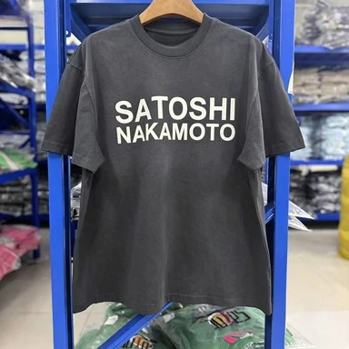 Casual summer loose T-shirt for couples of both genders. Classic letter pattern. Washed black cotton T-shirt.