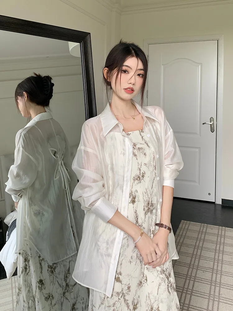 Femmes été 2025 nouveau noeud Sle évider Protection solaire irt léger en mousseline de soie vêtements d'extérieur Cardigan blanc