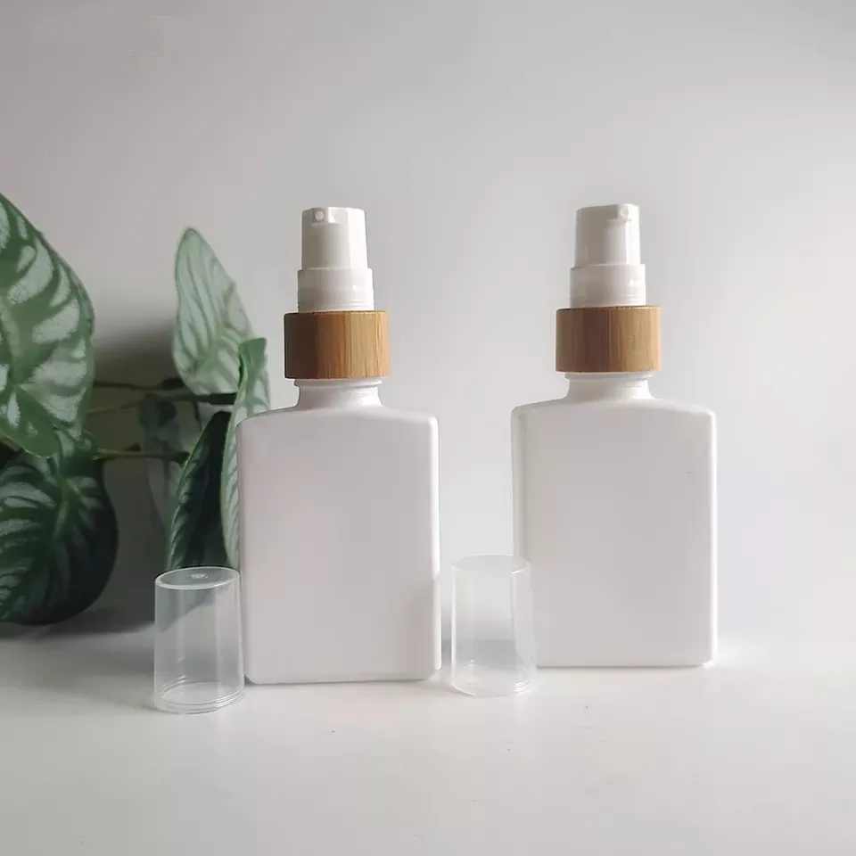 

Cosmetic Packaging 30ml 1oz Empty White Glass Bamboo Cover Refillable Square Shape Lotion Travel Bottle Serum Skincare Container