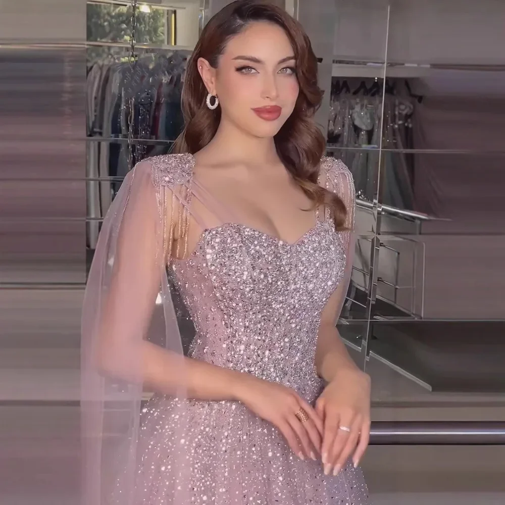 Vestido de noche acampanado con cuentas de tul rosa de lujo con mangas tipo capa para mujer, vestido personalizado de graduación Serene Hill 2025 BLA73072
