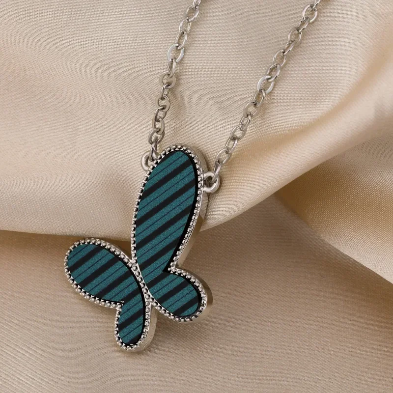 

The 2025 Striped Butterfly necklace is a fashionable and versatile women's sweater necklace