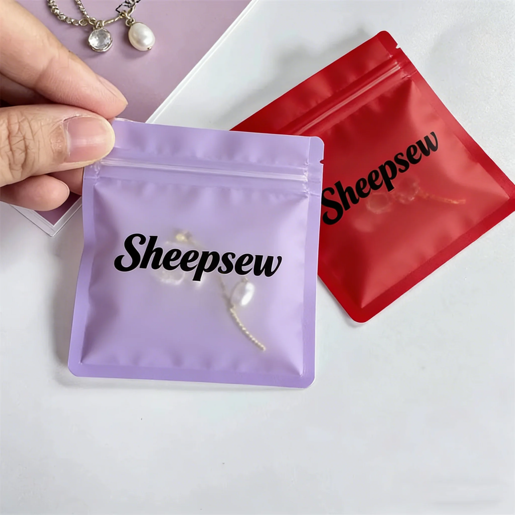 100pcs custom matte Frosted Jewelry zipper Bag，customized high-quality jewelry packaging, custom jewelry bag with you logo