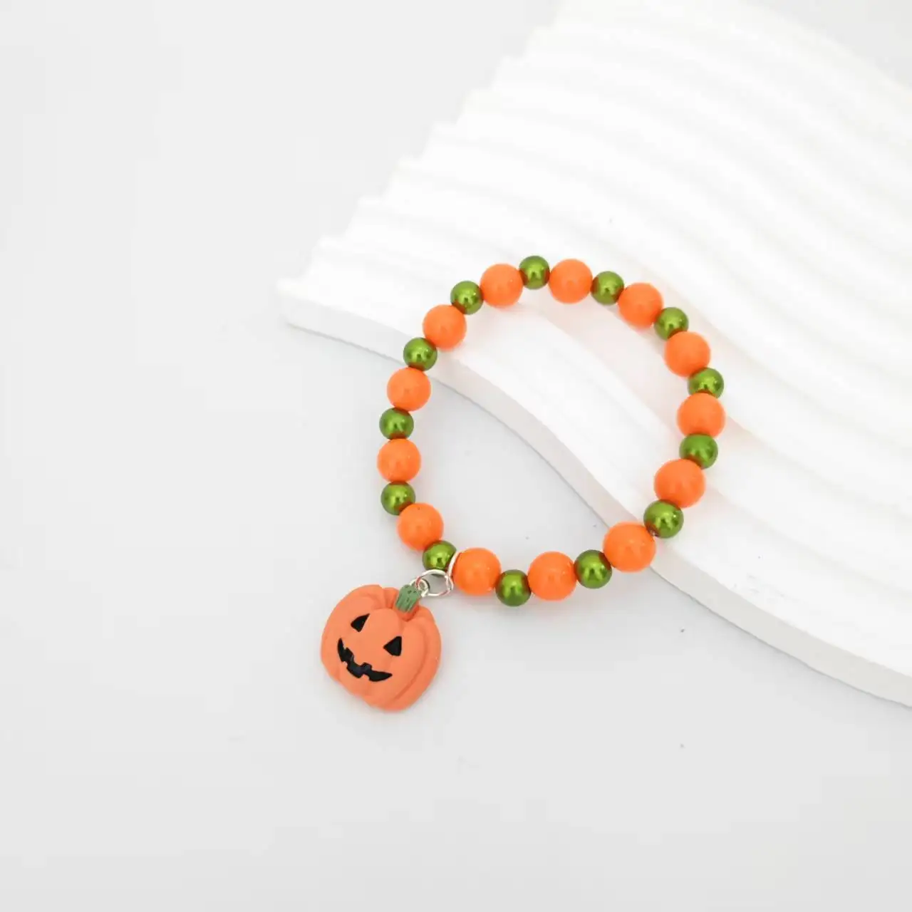 

Kids Halloween Bracelets Orange Pumpkin Ghost Face Charm Bracelet Women Girls Stretch Statement Bracelet Set