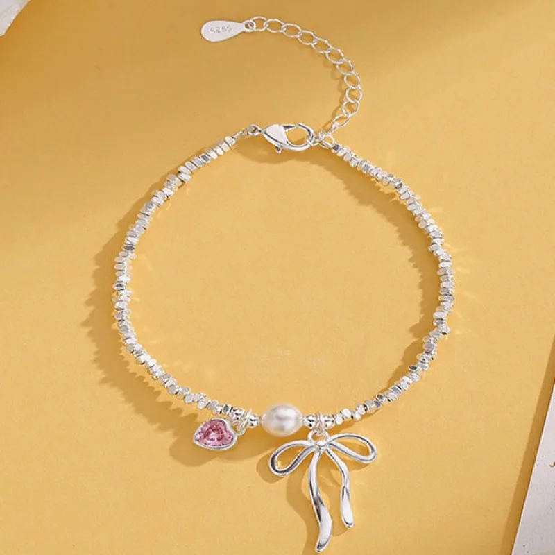 سوار على شكل قلب وردي من الفضة الإسترليني عيار 925 للنساء، سلسلة مجوهرات أنيقة على شكل فيونكة من اللؤلؤ هدية لحفلات أعياد ميلادها