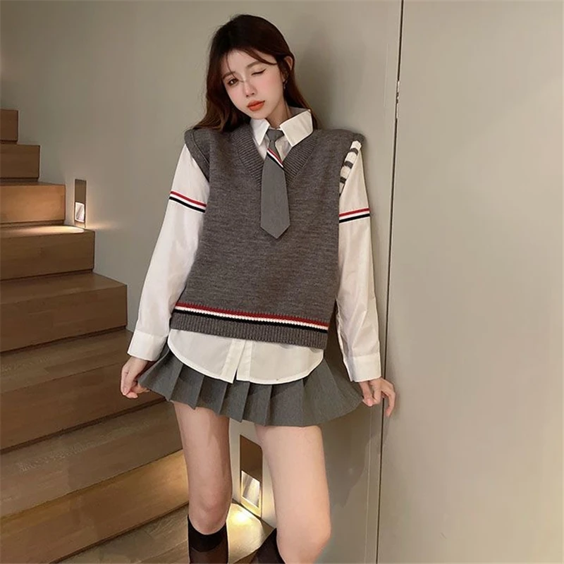 Japanische koreanische lose lässige jk Uniform Set für Frauen 4-teilige graue Strickweste Krawatten hemd hohe Taille Falten rock Frühling Herbst