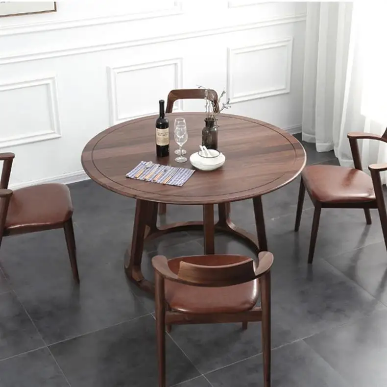 Mesa de jantar redonda de madeira maciça de nogueira preta norte-americana nórdica moderna e simples mesa de jantar e cadeiras domésticas pequenas separadas