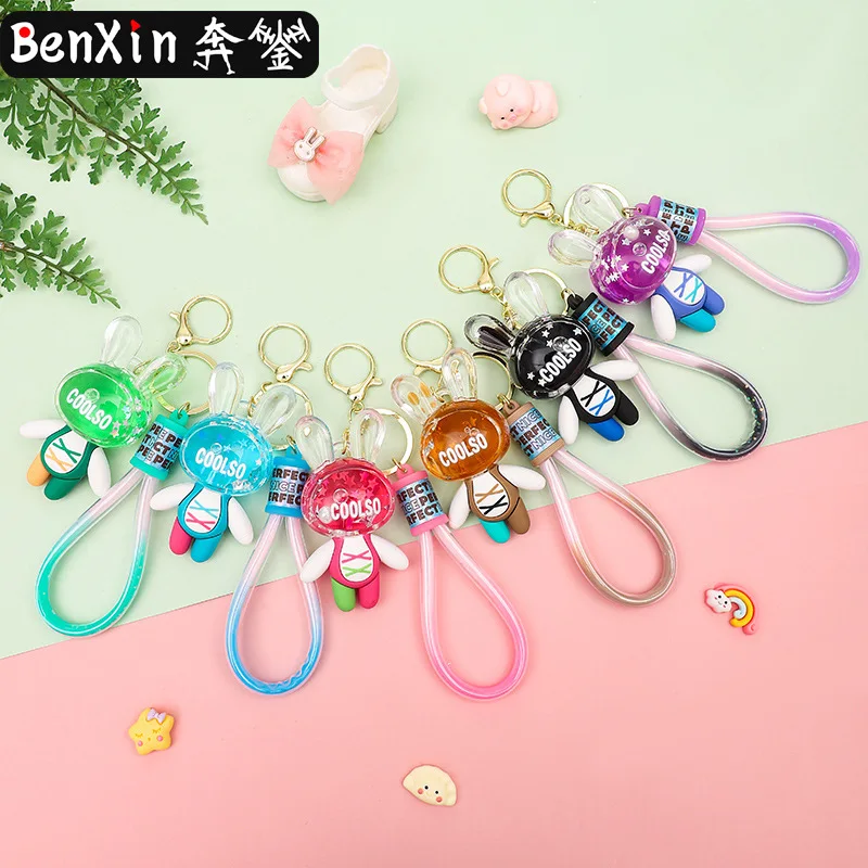 

The MINISO Fashion and creative Oil within Oil Flowing Sand Binding Rabbit key chain pendant is exquisite