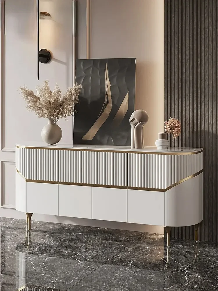 entrance hall is decorated with lockers, and the semi-circular rock plate sideboard is against