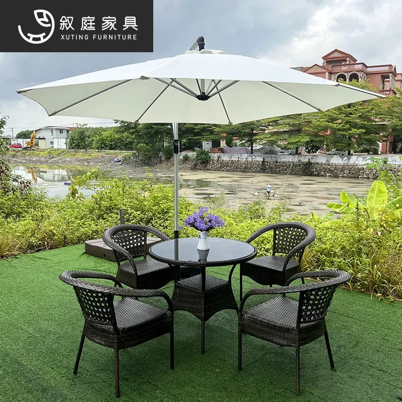 Outdoor rattan chair three-piece set garden courtyard hand-woven chair outdoor milk tea shop outside the rattan table and chair