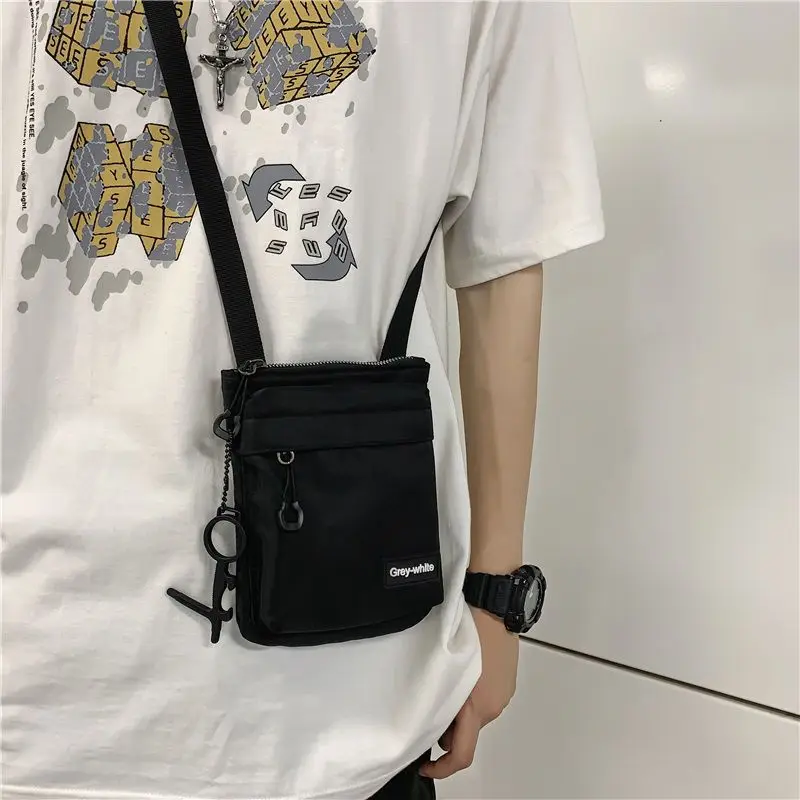 Torby listonoszki dla mężczyzn na co dzień płócienna torba na ramię z zamkiem błyskawicznym prosta mała torba na ramię typu crossbody torba męska z brelokiem