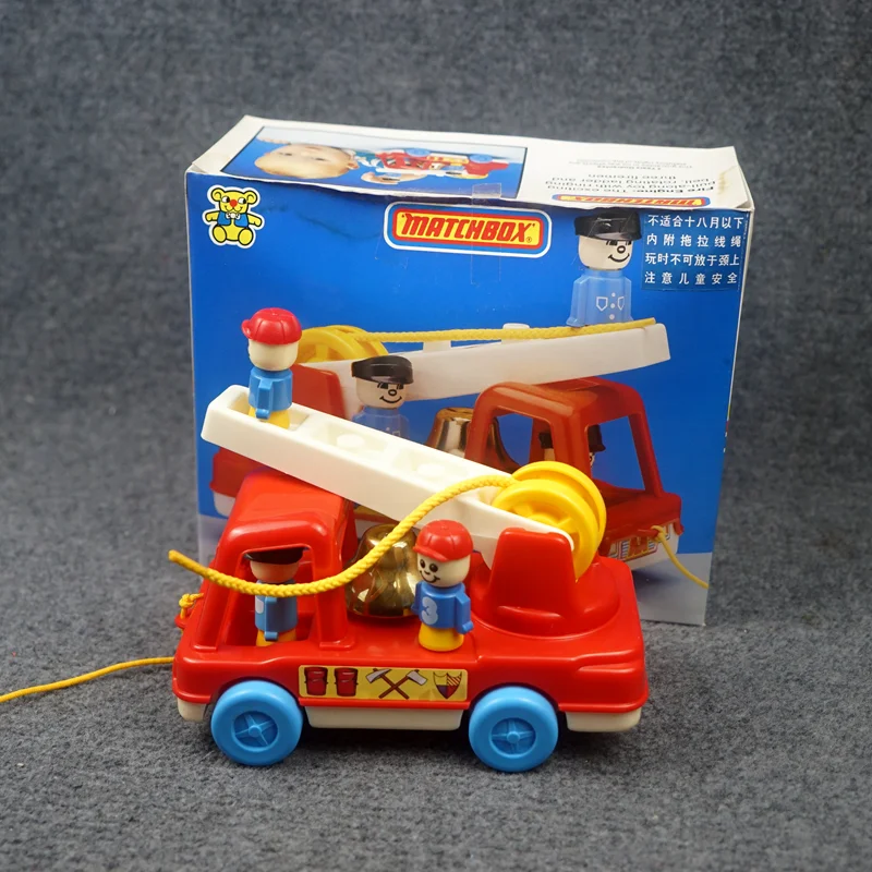 

In stock Vintage Pull - String Fire Truck with Bell - Retro Toy, Pull - Along Sliding Fire Engine