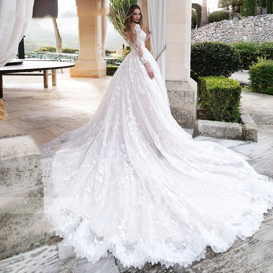 Flavinke カスタマイズされた夜会服のウェディングドレスプリンセス背中の開いたビーズレースアップリケ長袖ブライダルドレス Vestidos De Novia