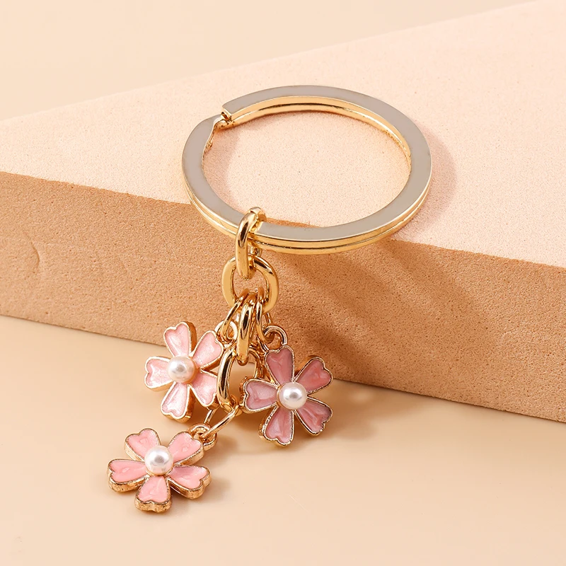 Aihua 40 Farben Niedlicher Pflanzen-Schlüsselanhänger Emaille Sakura-Blumen-Schlüsselanhänger für Frauen Mädchen Handtasche Anhänger Autoschlüsselhalter DIY Schmuck Geschenke – Detail 32