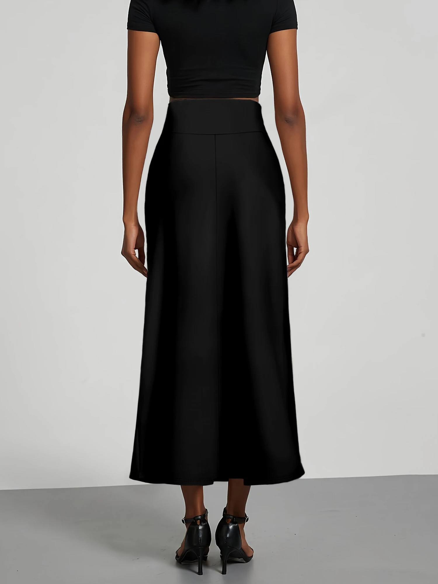 تنورة متوسطة الطول بحورية البحر بلون موحد، مصنوعة من نسيج ناعم ومقاوم للتجاعيد. أسلوب متوسط الطول يسطح الشكل، مما يجعلها