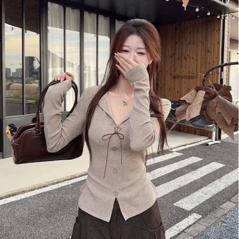 

American style spicy girl retro black bow V-neck long sleeved t-shirt autumn women's slim fit trendy top millennium style