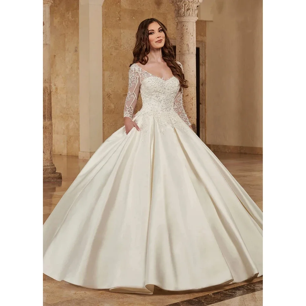 

Customized Elegant Satin Illusion Long Sleeve Wedding Dress Sweetheart Appliques Beading Bridal Gown Princess Bride Dress