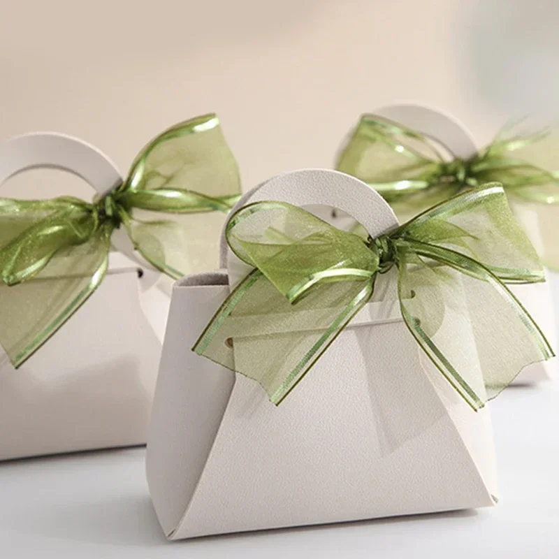 20PCS Leder Geschenk Taschen Bogen Band Verpackung Tasche Hochzeit Gunsten Verteiler Taschen Weihnachten Süßigkeiten Verpackung Box Mini Handtasche – Detail 15