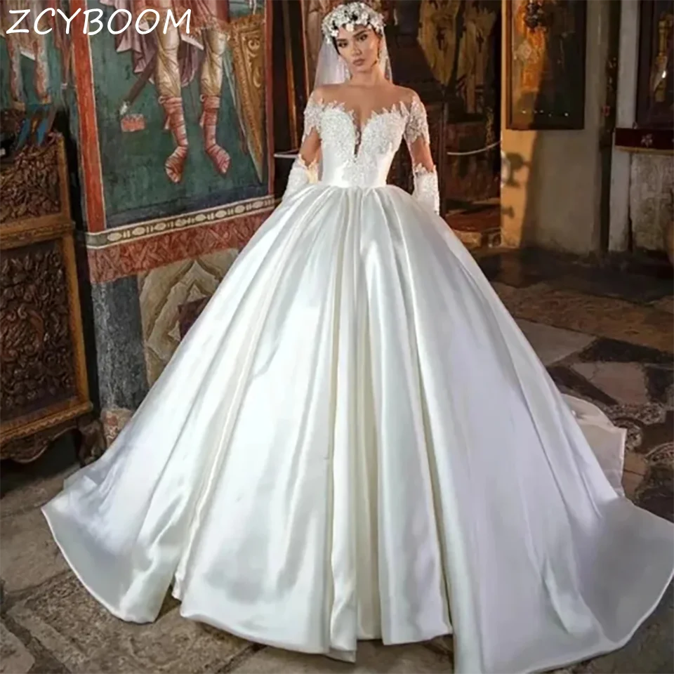 

Luxury Princess Beaded Sweetheart Long Sleeves Satin Ball Gown Wedding Dresses 2024 Backless Court Train Bridal Gown For Women