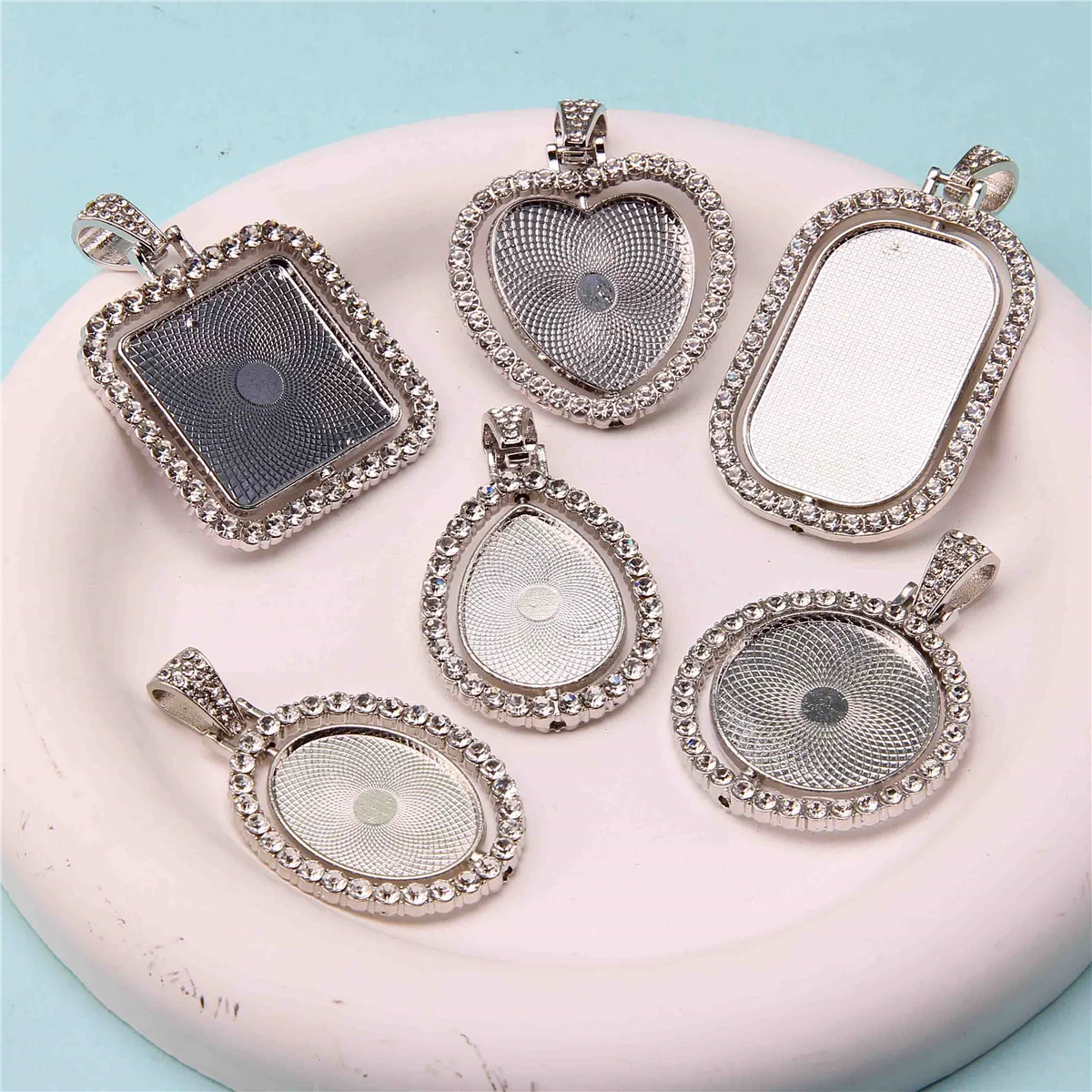 30pcs new double-sided round oval alloy base diamond movable head rotating pendant base manufacturer wholesale