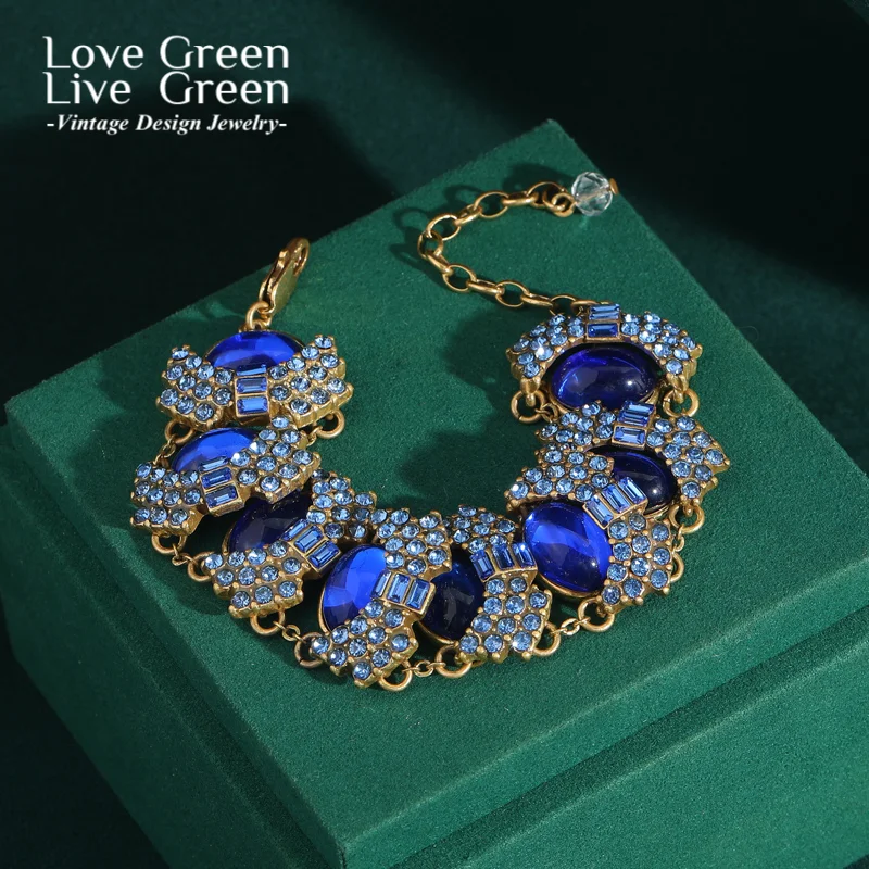 

Vintage Sapphire Blue Glazed Rhinestone Bracelet Studded Eyelashes And Eyes Bangle Gold Color Luxury Brand Jewelry For Woman