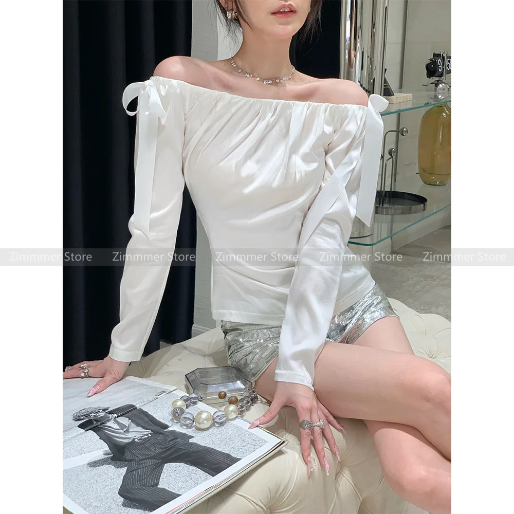 

Premium sense of mulberry silk one-line neck strapless bow blouse female 2024 design niche pressed pleated silk blouse