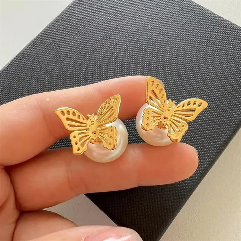 

Small enamel sculpture flower earrings European and American temperament fashion