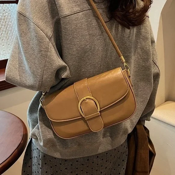 

Spring Summer 2025: Vintage Semi - Round Saddle Shoulder Bag - A Stylish Belt Buckle Messenger Bag of Premium - Quality Leather