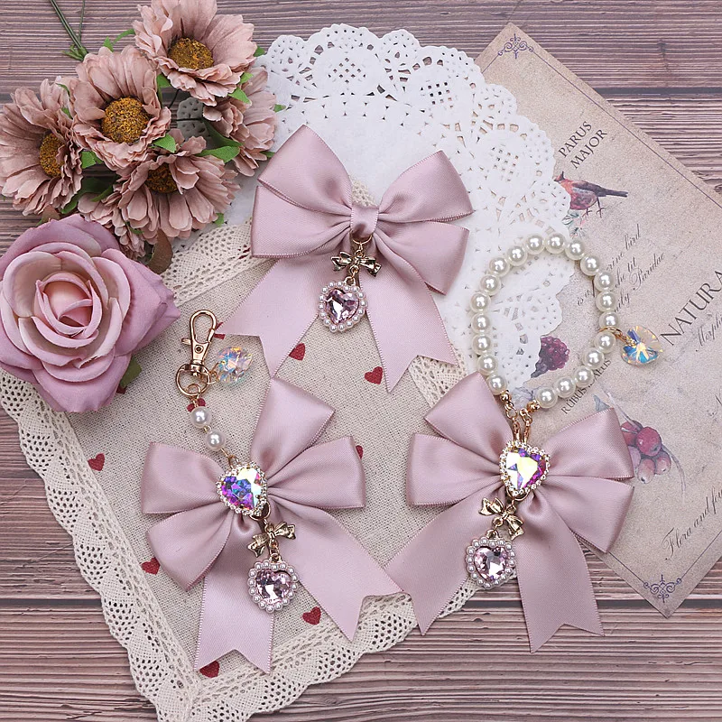 Ciondoli per borse da donna dolci Fiocco Portachiavi con perle delicate Stile giapponese Cuore Strass Perline Ciondolo per borsa Ita Elegante accessorio Bowknot