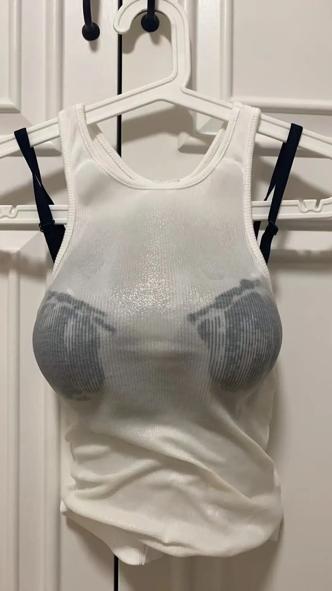 Camiseta sin mangas blanca húmeda transparente para mujer, diseño acolchado, Top corto sin mangas a la moda, traje ligero informal elegante a la moda