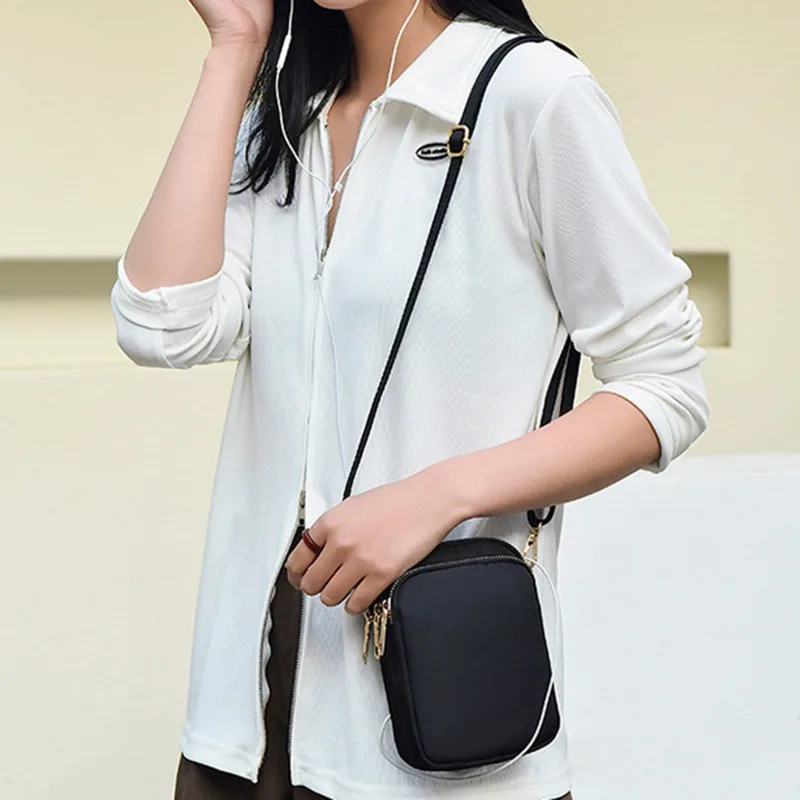 Minimalist Vertical Crossbody Phone Bag for Women Men Lightweight Nylon Shoulder Purse with Zipper Compact Coin Holder Sling view 3
