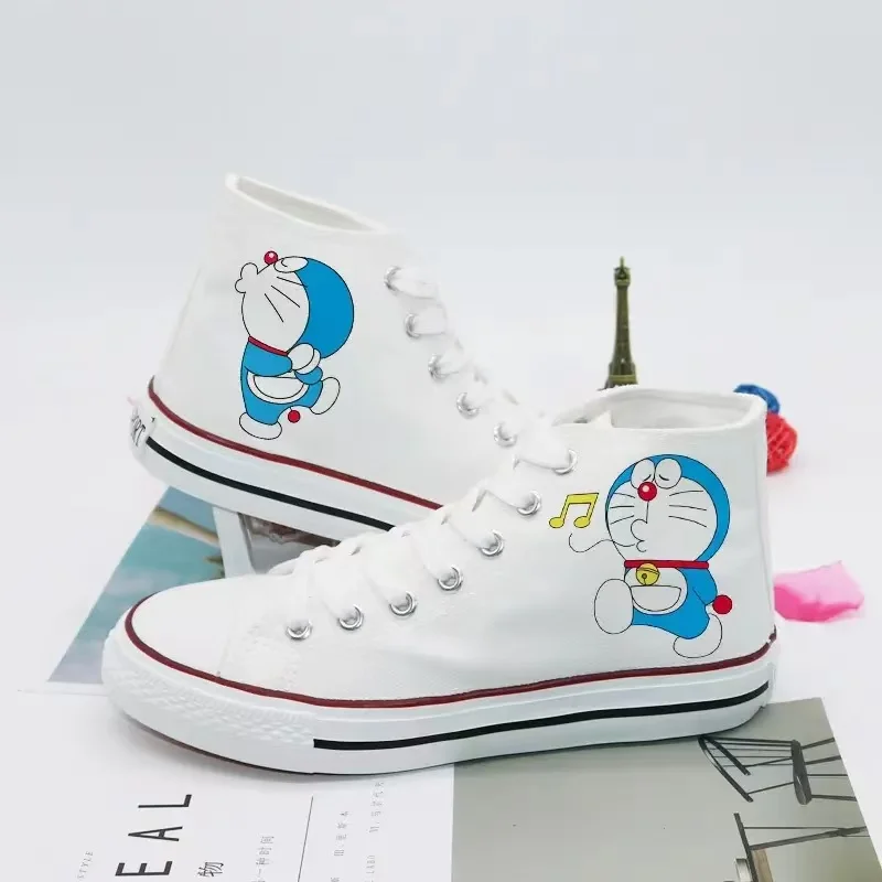 Doraemon echte Bilder schwarz weiß 2025, neue Frühling, Herbst, Winter, Mann, Segeltuchschuhe, lässig, Drop-Shipping, Damen-Skateschuhe