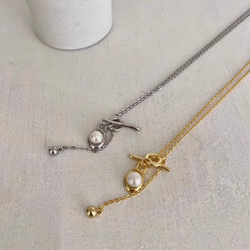 

Korean version of niche design pearl OT buckle necklace women's fashion personality simple and versatile high-end sense long
