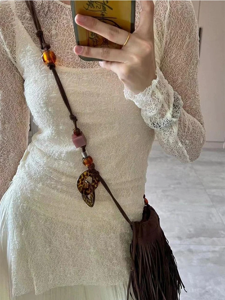 

Удобная кружевная ажурная базовая рубашка с эластичной мягкой тканью, модный дизайн с разрезом по низу, для носки как самостоятельный элемент или в многослойном стиле.