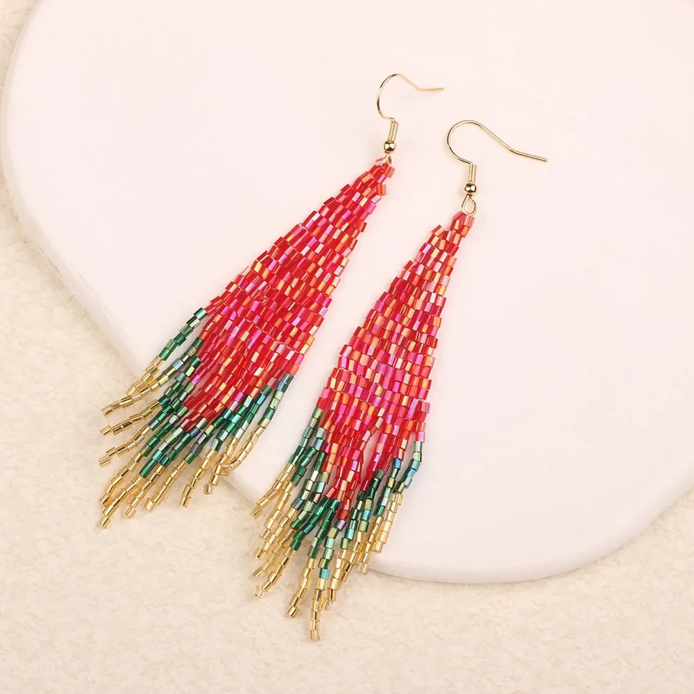Rice bead earrings Tassel Originality Hand knitting Gradient color Dazzling Bohemia Alloy Fashion Female Simple Beaded earrings