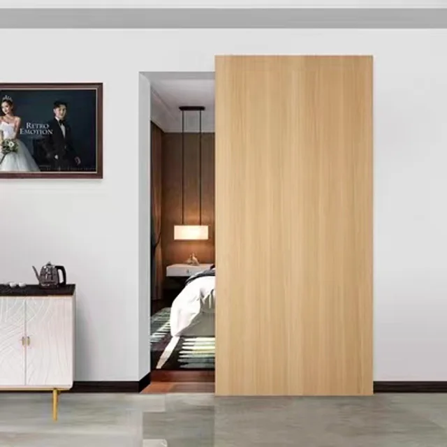 Sliding doors with magic sliding doors that fully hide hardware and track wooden doors with wall-mounted hidden sliding systems