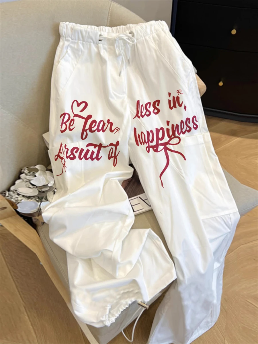 กางเกงทำงานพิมพ์ลายตัวอักษรสีขาวทันสมัยทรงหลวมเอวสูงแบบมีเชือกผูกสำหรับผู้ชายและผู้หญิงใส่ได้ทุกโอกาสในฤดูร้อน