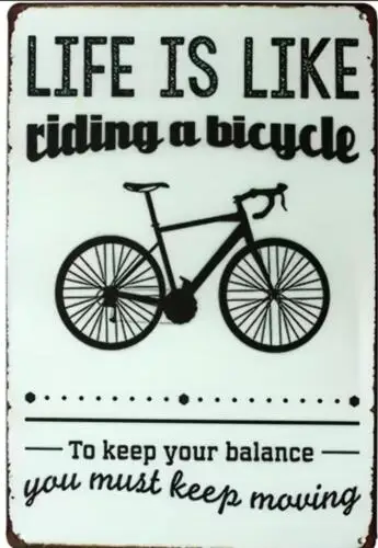 MOTIVATIONAL METAL SIGN LIFE IS RIDING A BICYLE TO KEEP YOUR BALANCE MOVE FORWAR