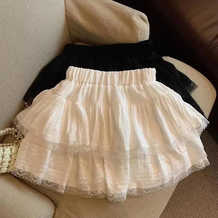 Dulce pastel hinchado faldas de mujer kawaii encaje patchwork negro Mini falda Campus Harajuku Casual versátil cintura elástica falda sólida