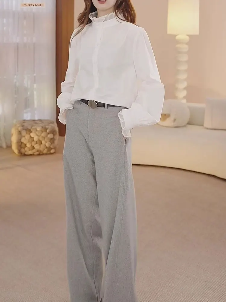 Elegancki, swobodny top z koronkowym kołnierzykiem, zapinany na jeden guzik, długi rękaw, idealny do pracy, modny, damski, wiosna 2025, marka Poetic Lin, luźny krój.