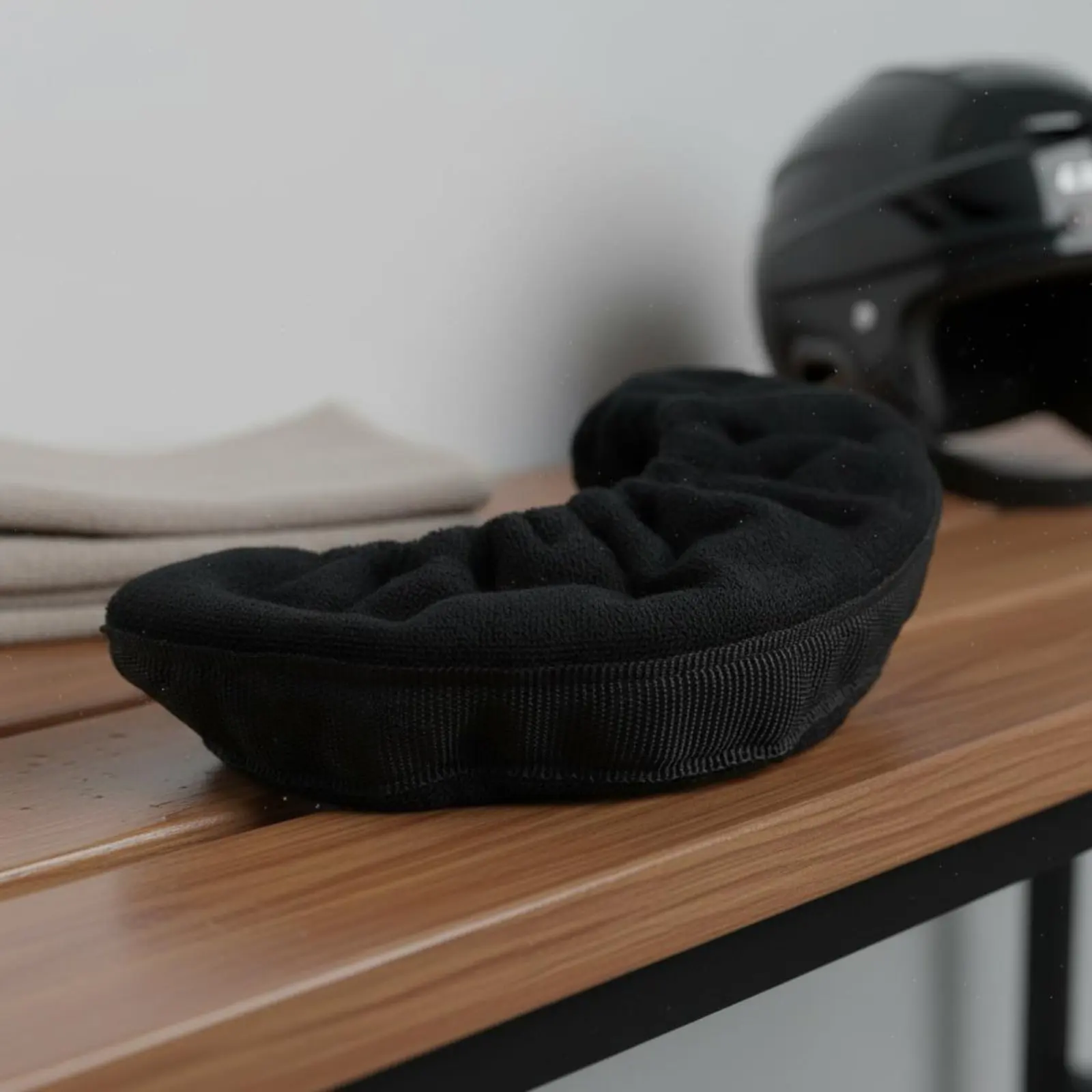 Skater wearing ice skates with blade covers on