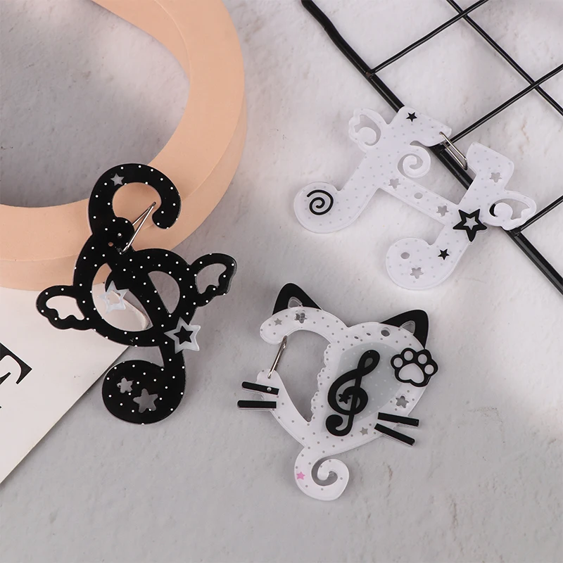 Kawaii أسود أبيض ملاحظات التوضيح الحلي المفاتيح حقيبة سحر الاكريليك قلادة حلقة تسلق ظهره قلادة الديكور الهدايا