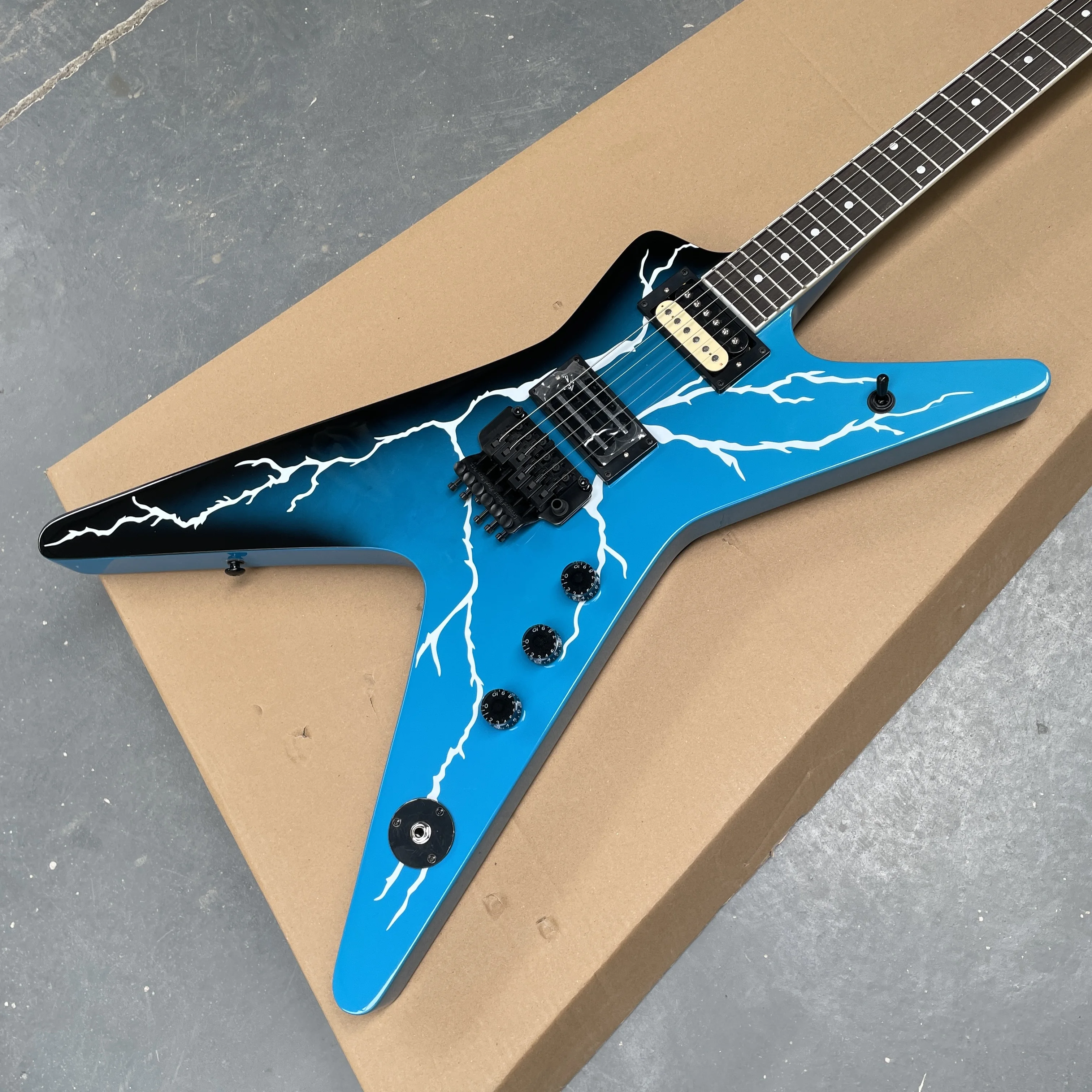 

blue lightning electric guitar with black hardware and double-locking tremolo system guitars,professional speed-picking guitarra