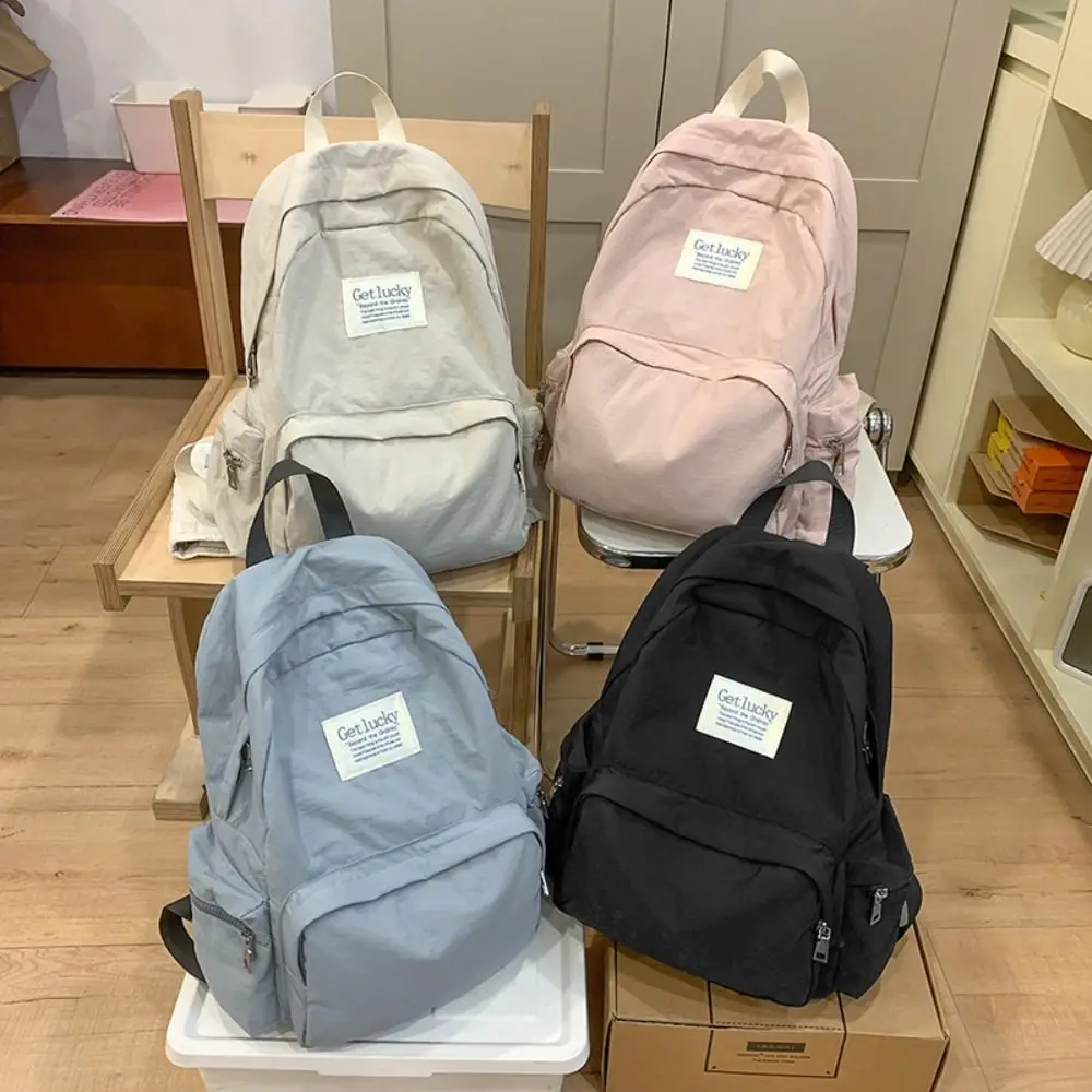

Simple Lightweight Travel Backpack Nylon Korean Style Solid Color Backpack Large Capacity Waterproof Student Schoolbag Teenagers