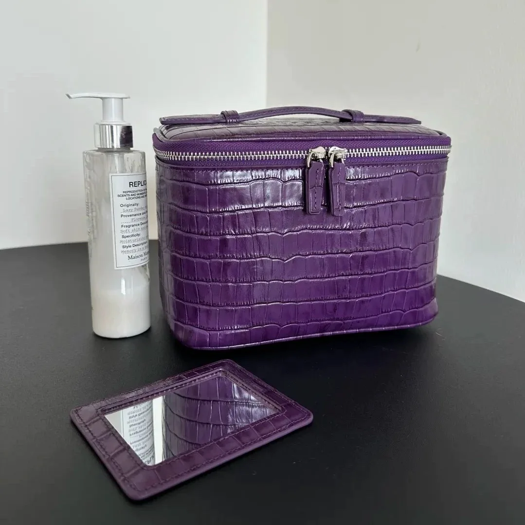 Top layer cowhide makeup bag 2025 new niche design travel portable toiletries bag high-capacity storage soft leather handbag
