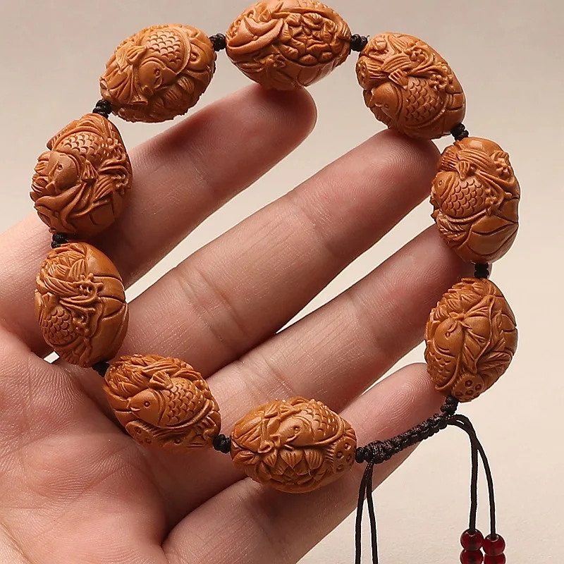 

Natural Carp Playing With Relief Pond Moonlight Olive Stone Bracelet Carving