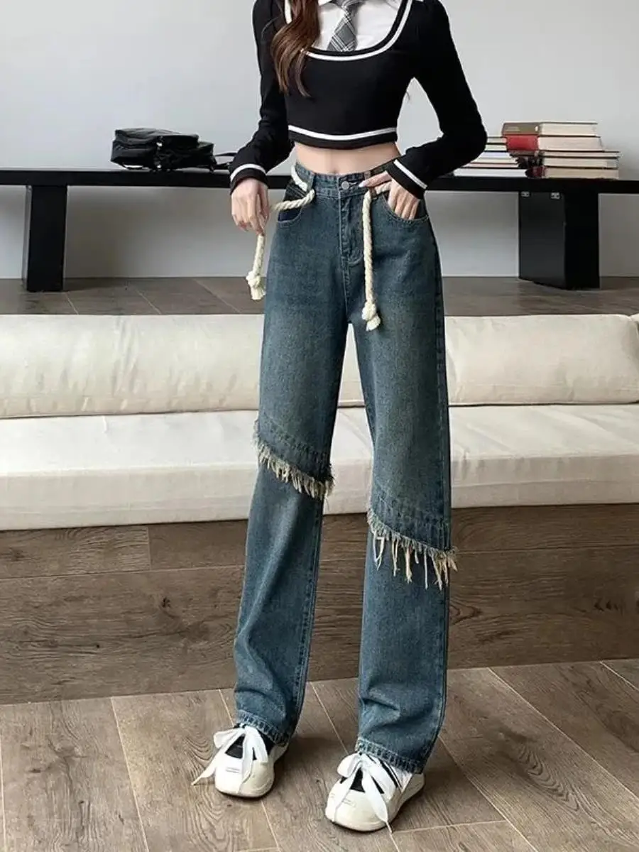 calca-jeans-feminina-retro-de-perna-larga-com-bainha-desfiada-cintura-alta-caimento-solto-e-ajustado-versatil-moderna-re