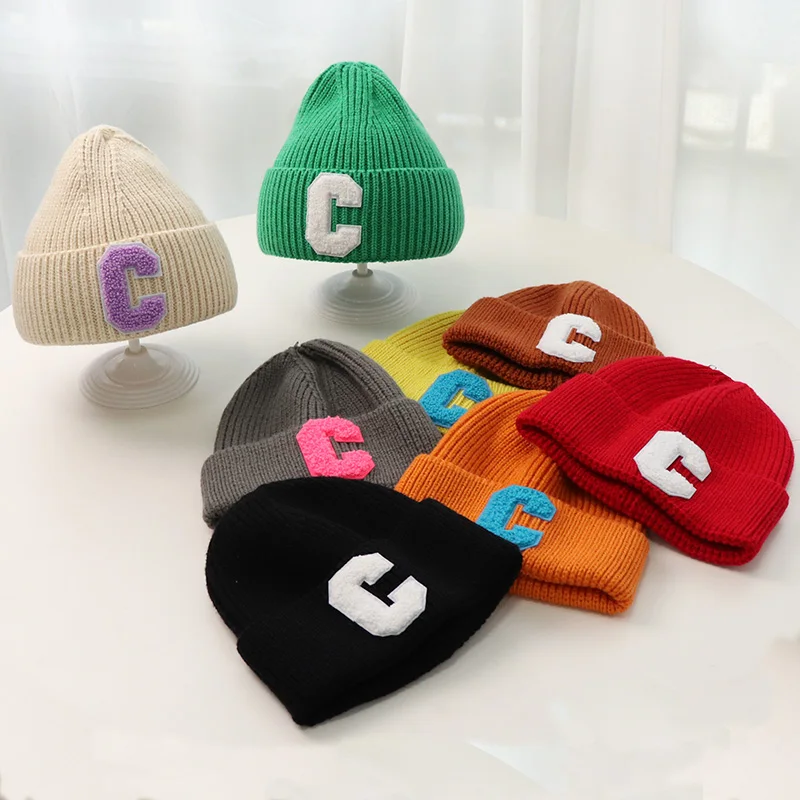 C letter knitted hat Warm boys and girls Korean autumn and winter thickened wool hat candy color simple ear protection hat