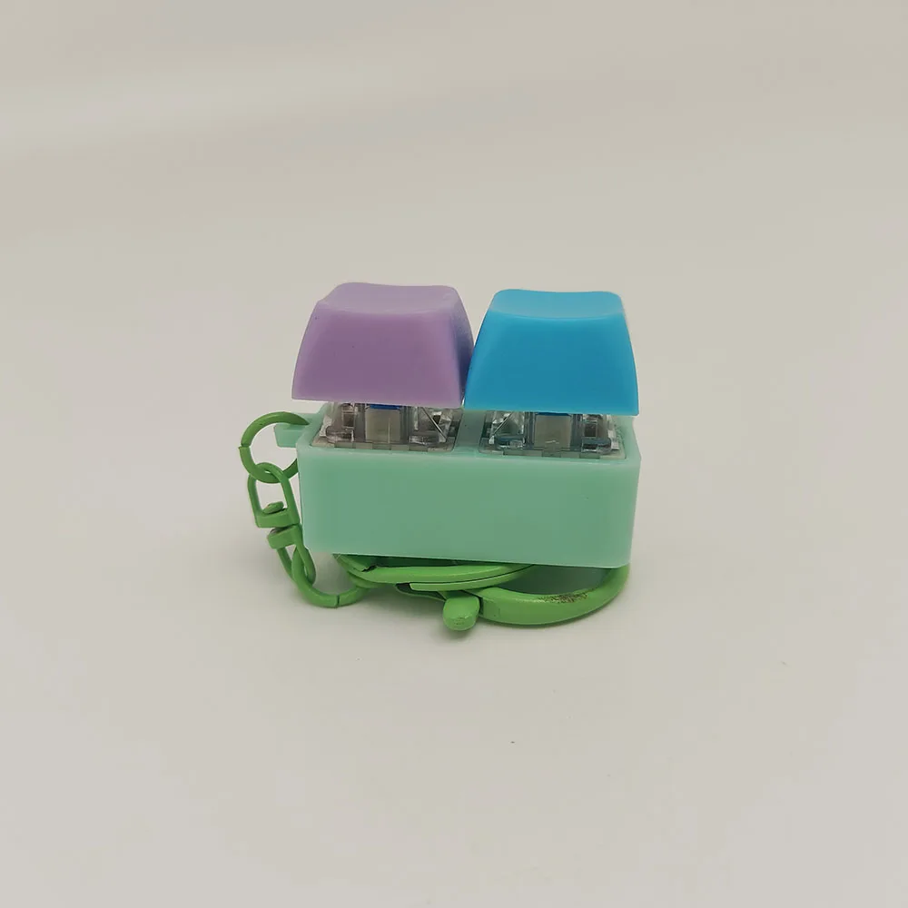 大人用の輪ゴム付きポップそわそわキーホルダー、青いストレス解消おもちゃ、デスクアクセサリー