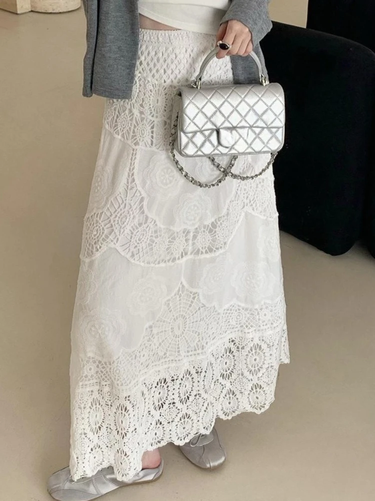 2025 novo no verão design de moda nicho damasco saias boêmio estilo férias cor sólida rendas gancho flor midi saia para mulher