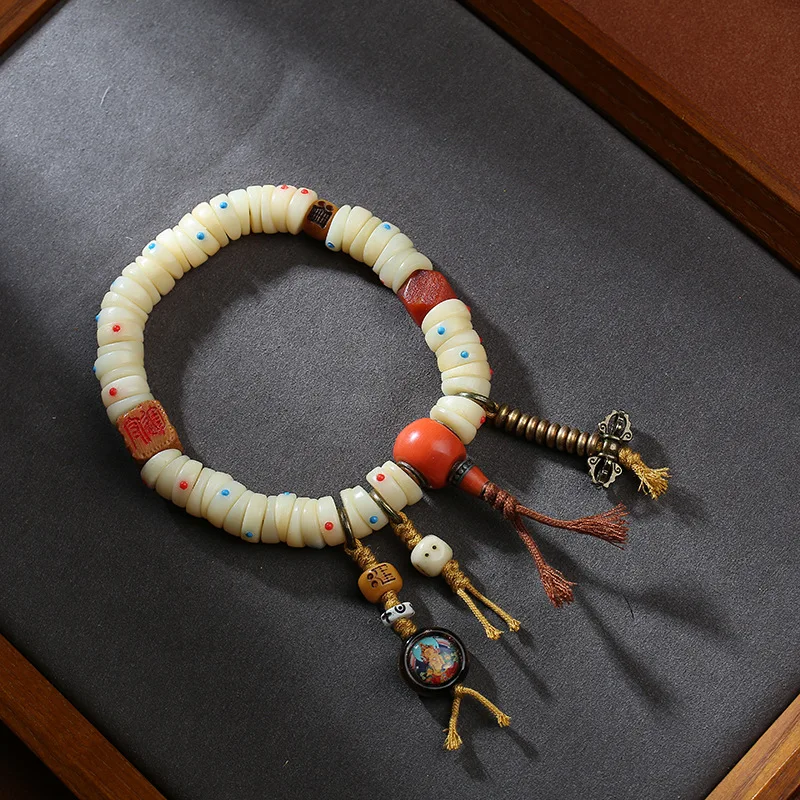 Tibetan-style bone inlaid with agate stone, copper pestle subduing demons, multi-ring hand-held piece of Yellow